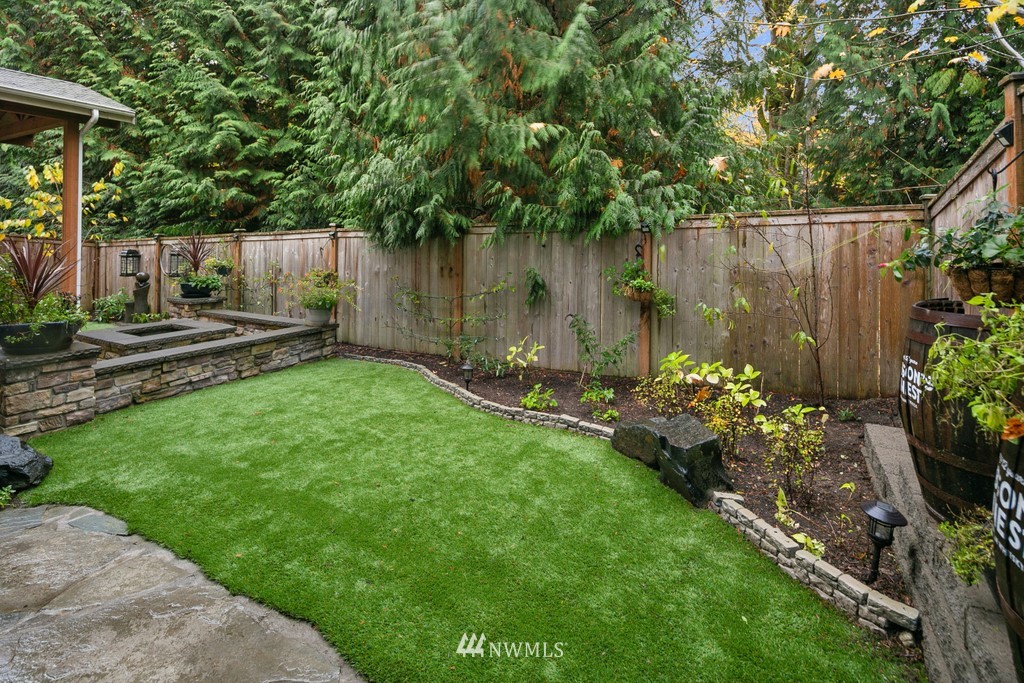 21920 37th Avenue Southeast Bothell, WA 98021 - Photo 38 of 39 a garden view with a seating space