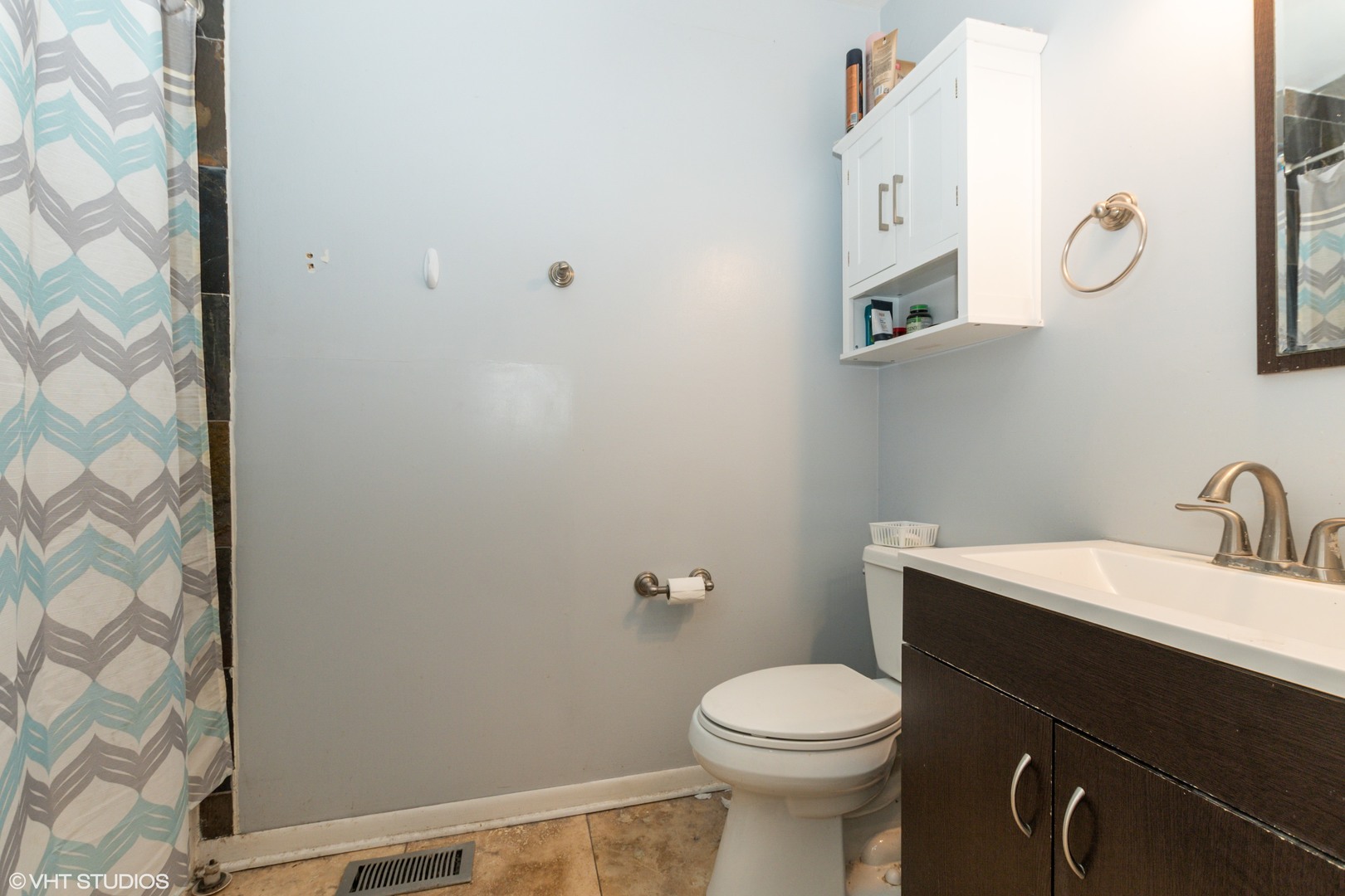 5746 Timberlane Road Matteson, IL 60443 - Photo 16 of 19 a bathroom with a sink a toilet and vanity