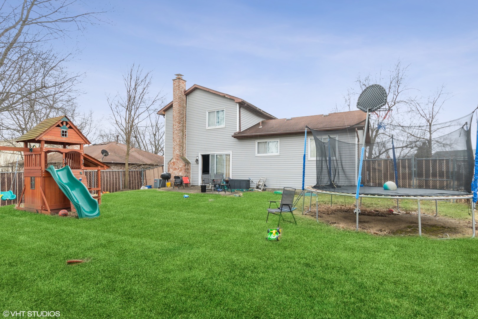5746 Timberlane Road Matteson, IL 60443 - Photo 18 of 19 a view of backyard with small cabin and wooden fence