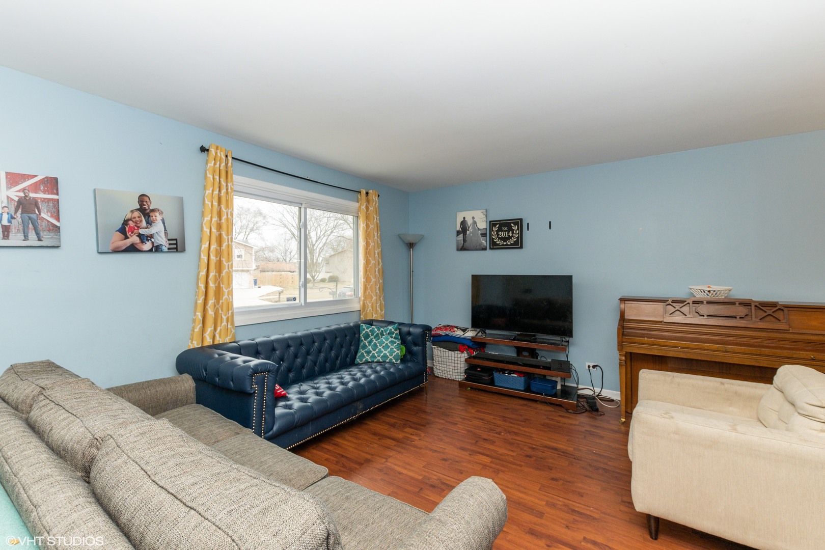 5746 Timberlane Road Matteson, IL 60443 - Photo 3 of 19 a living room with furniture and a flat screen tv