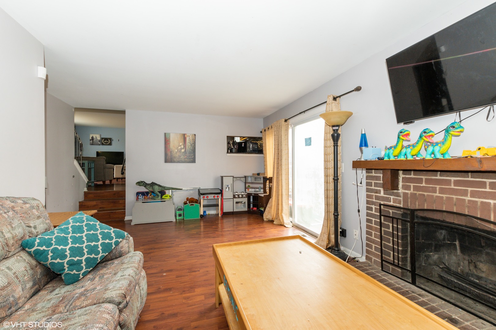 5746 Timberlane Road Matteson, IL 60443 - Photo 8 of 19 a living room with furniture and a flat screen tv