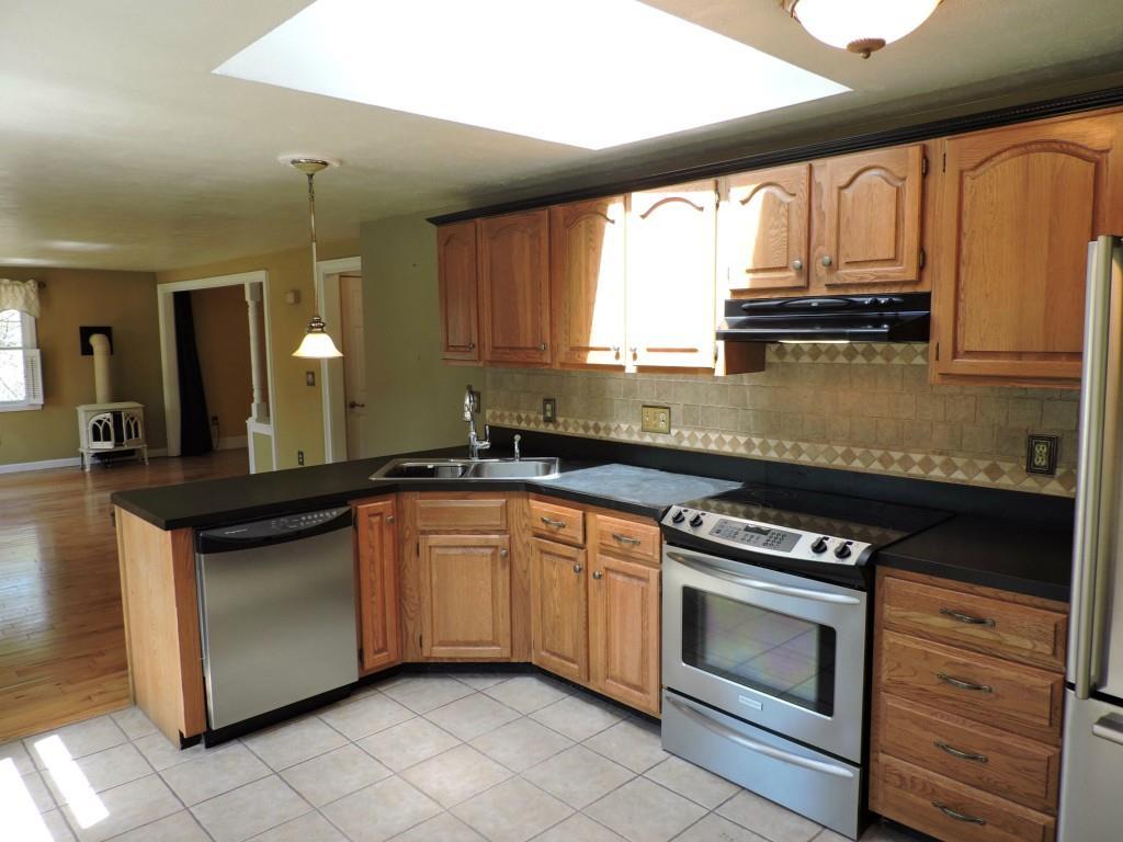 61 South Skillings Road Arundel, ME 04046 - Photo 27 of 27 An open floor plan makes...