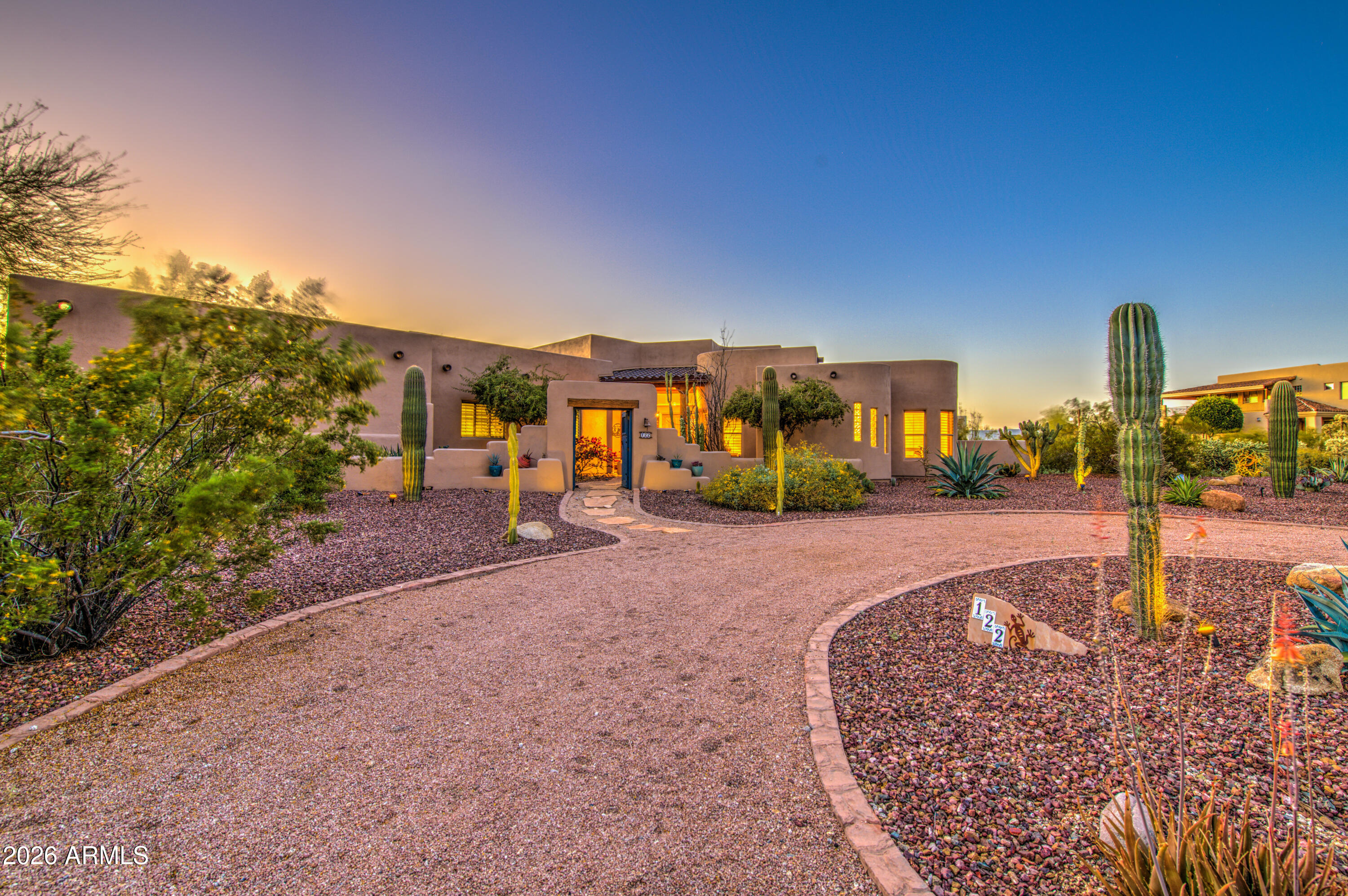 8540 East McDowell Road, Unit 122 Mesa, AZ 85207 - Photo 3 of 75 a view of a swimming pool with an outdoor seating