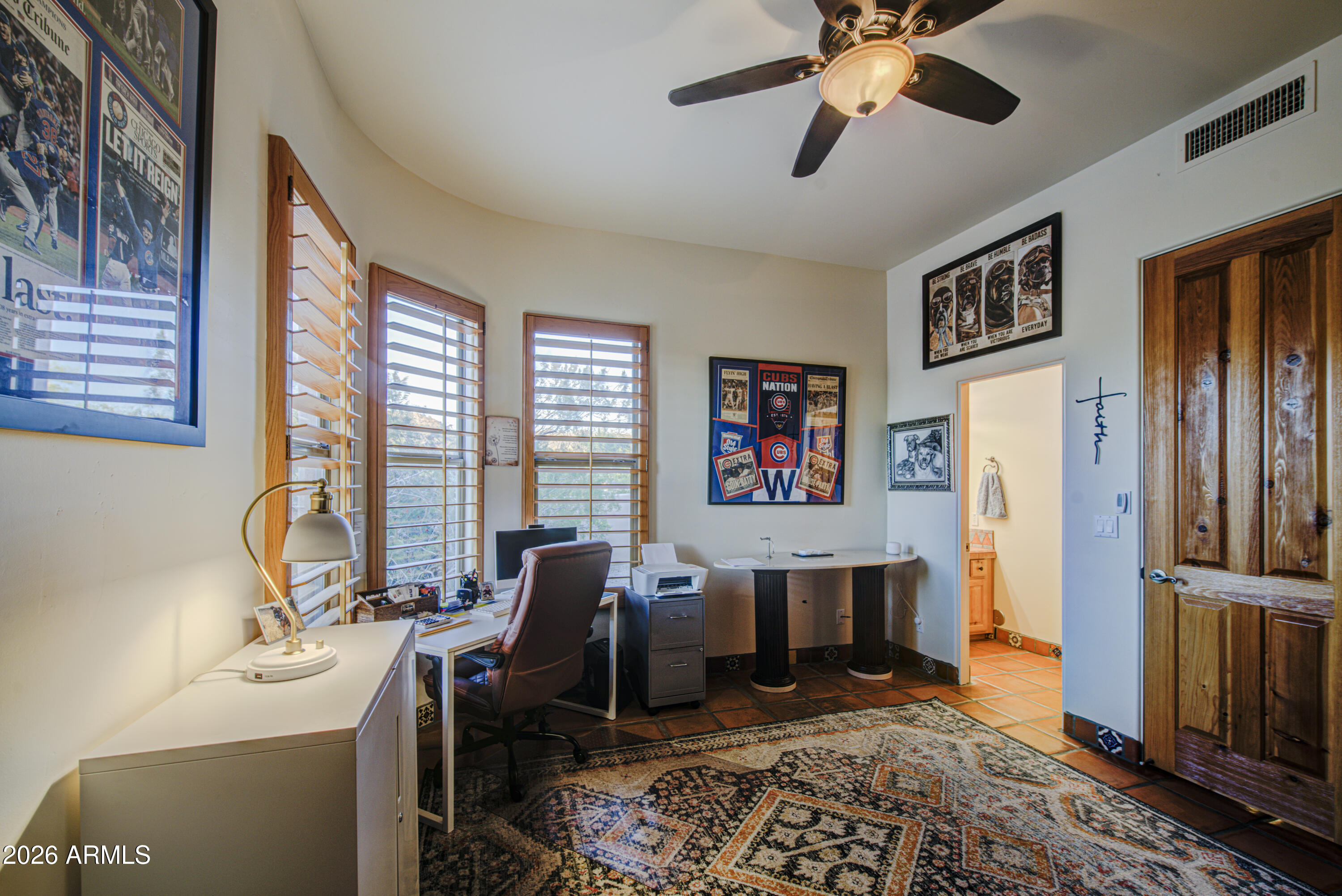 8540 East McDowell Road, Unit 122 Mesa, AZ 85207 - Photo 34 of 75 a living room with furniture and a window