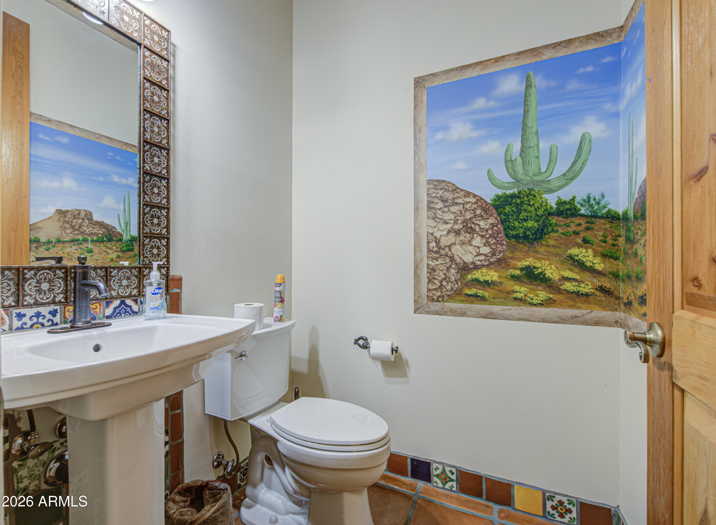 8540 East McDowell Road, Unit 122 Mesa, AZ 85207 - Photo 37 of 75 a bathroom with a sink and a mirror