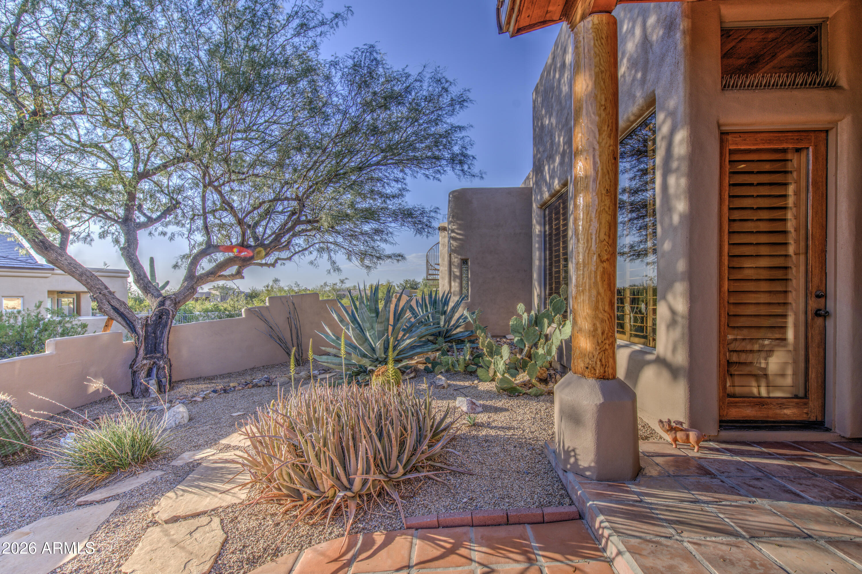 8540 East McDowell Road, Unit 122 Mesa, AZ 85207 - Photo 44 of 75 a view of balcony with potted plants