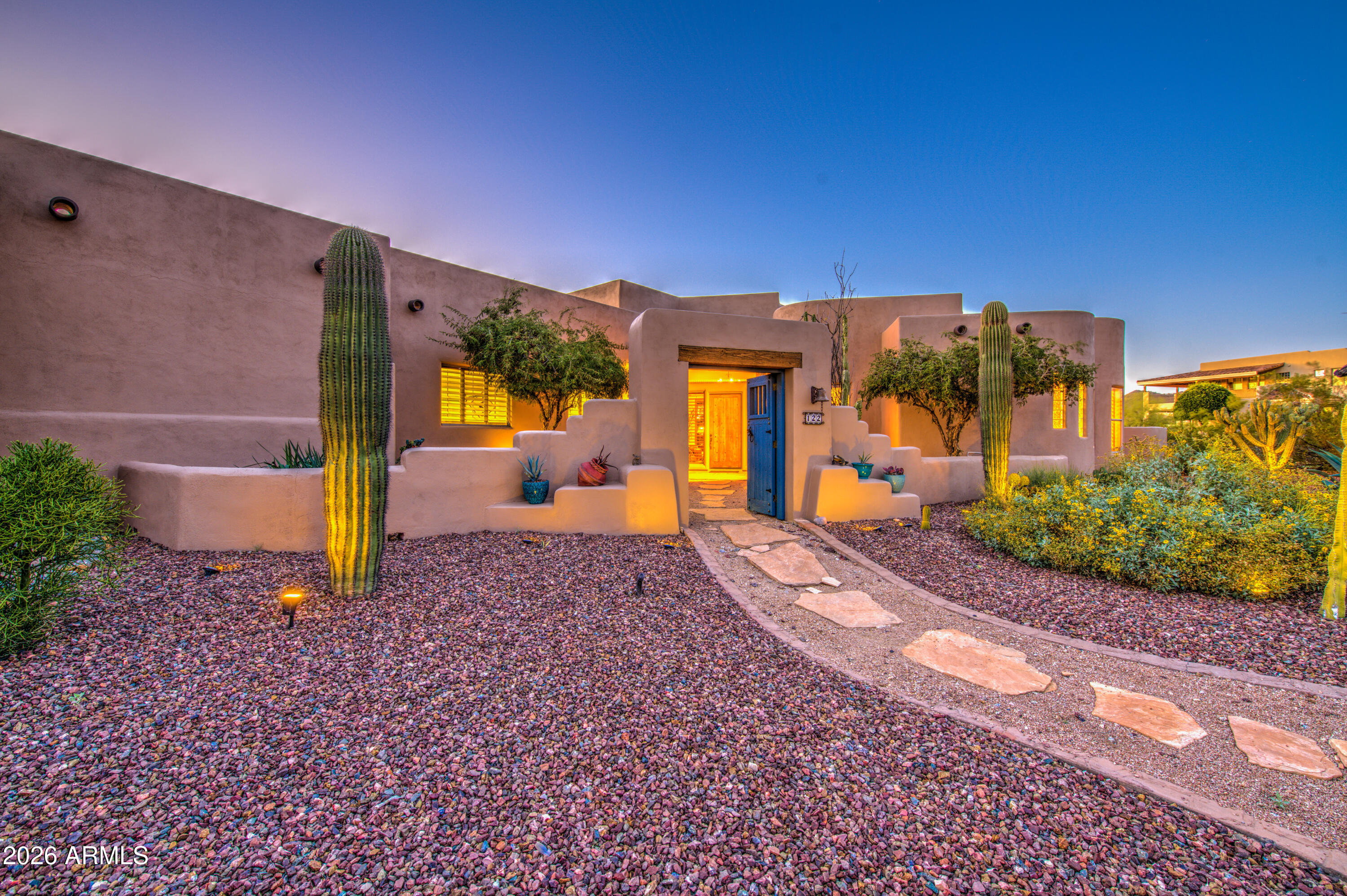 8540 East McDowell Road, Unit 122 Mesa, AZ 85207 - Photo 5 of 75 a view of a street with a building in the background