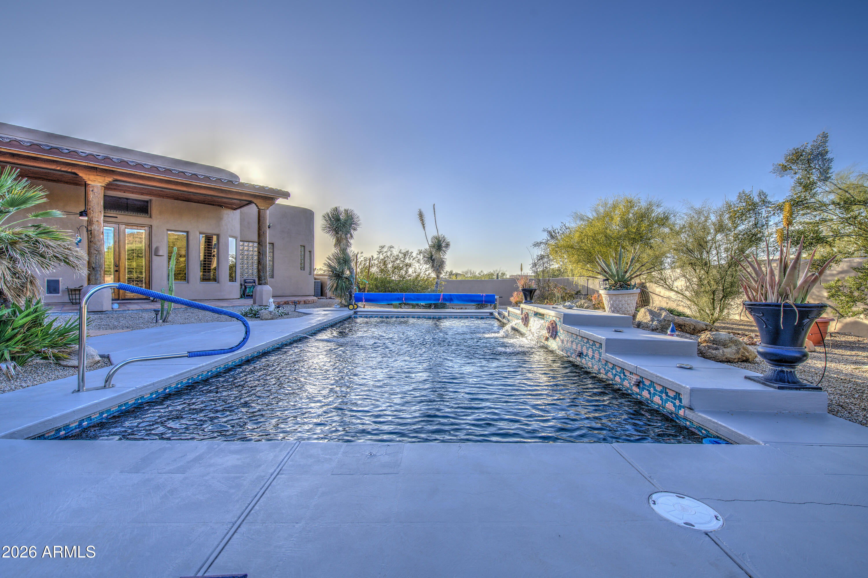 8540 East McDowell Road, Unit 122 Mesa, AZ 85207 - Photo 53 of 75 a view of a house with entertaining space