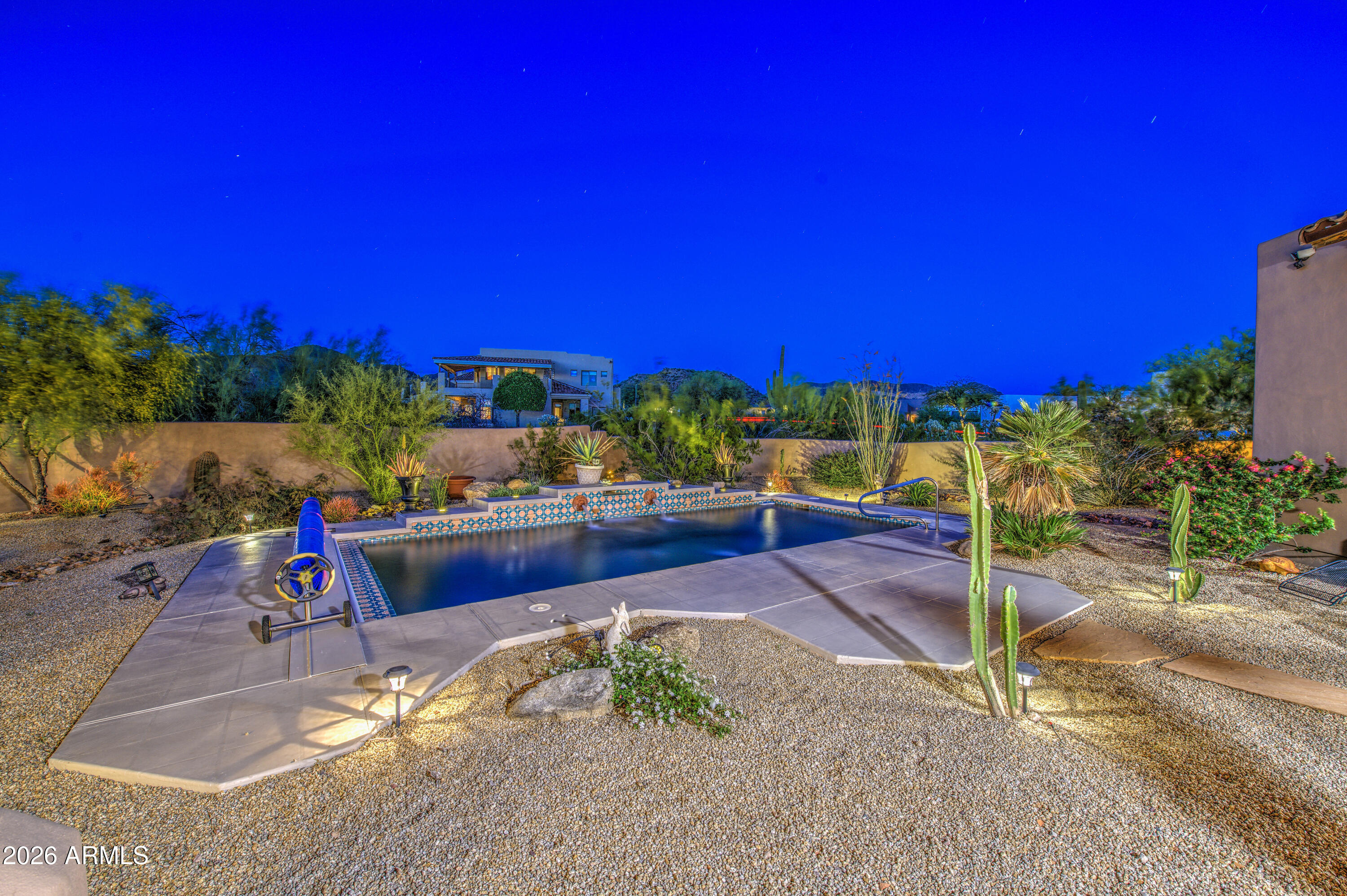 8540 East McDowell Road, Unit 122 Mesa, AZ 85207 - Photo 56 of 75 a view of a swimming pool with a patio