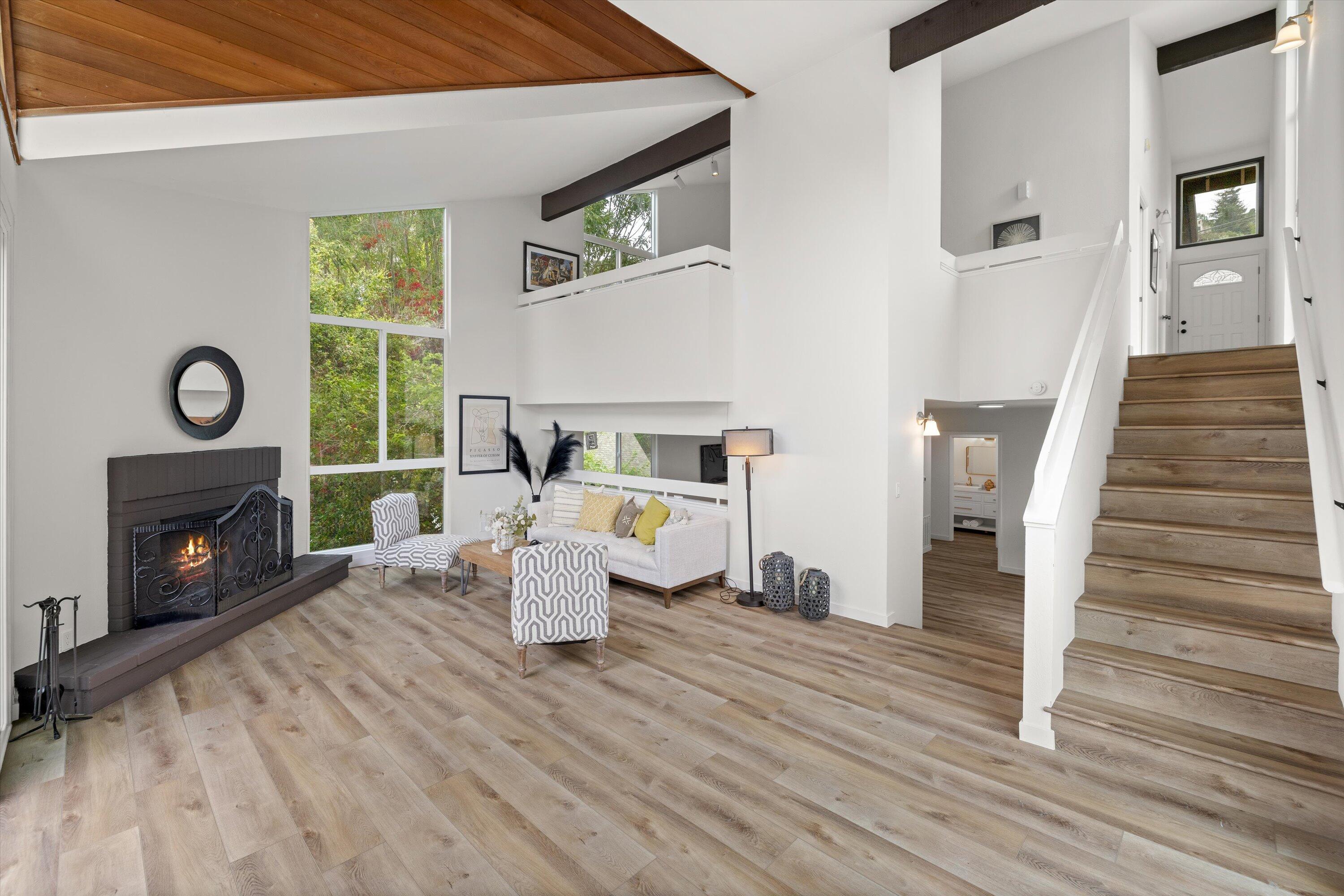 827 Cheltenham Road Santa Barbara, CA 93105 - Photo 11 of 47 a living room with furniture and a fireplace