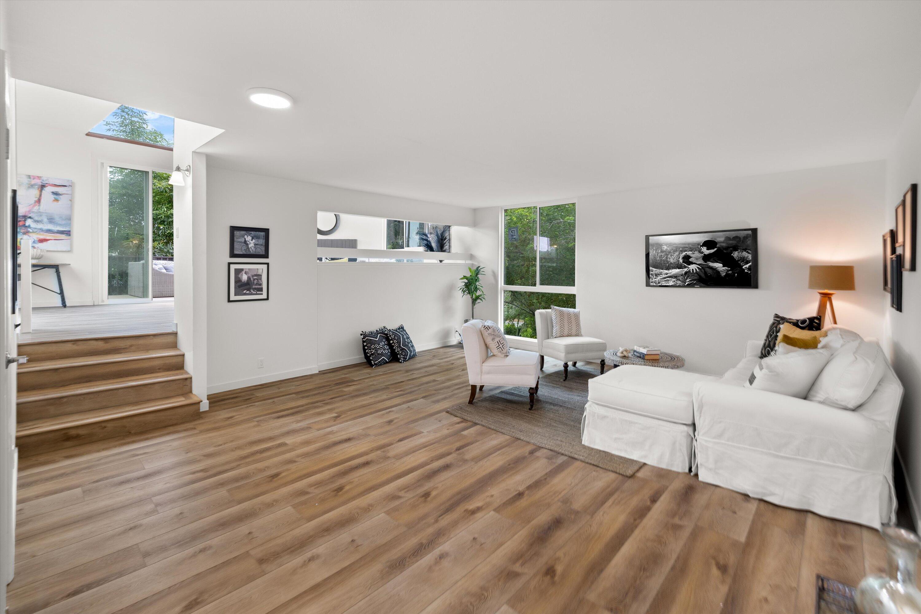827 Cheltenham Road Santa Barbara, CA 93105 - Photo 15 of 47 a living room with furniture and a wooden floor