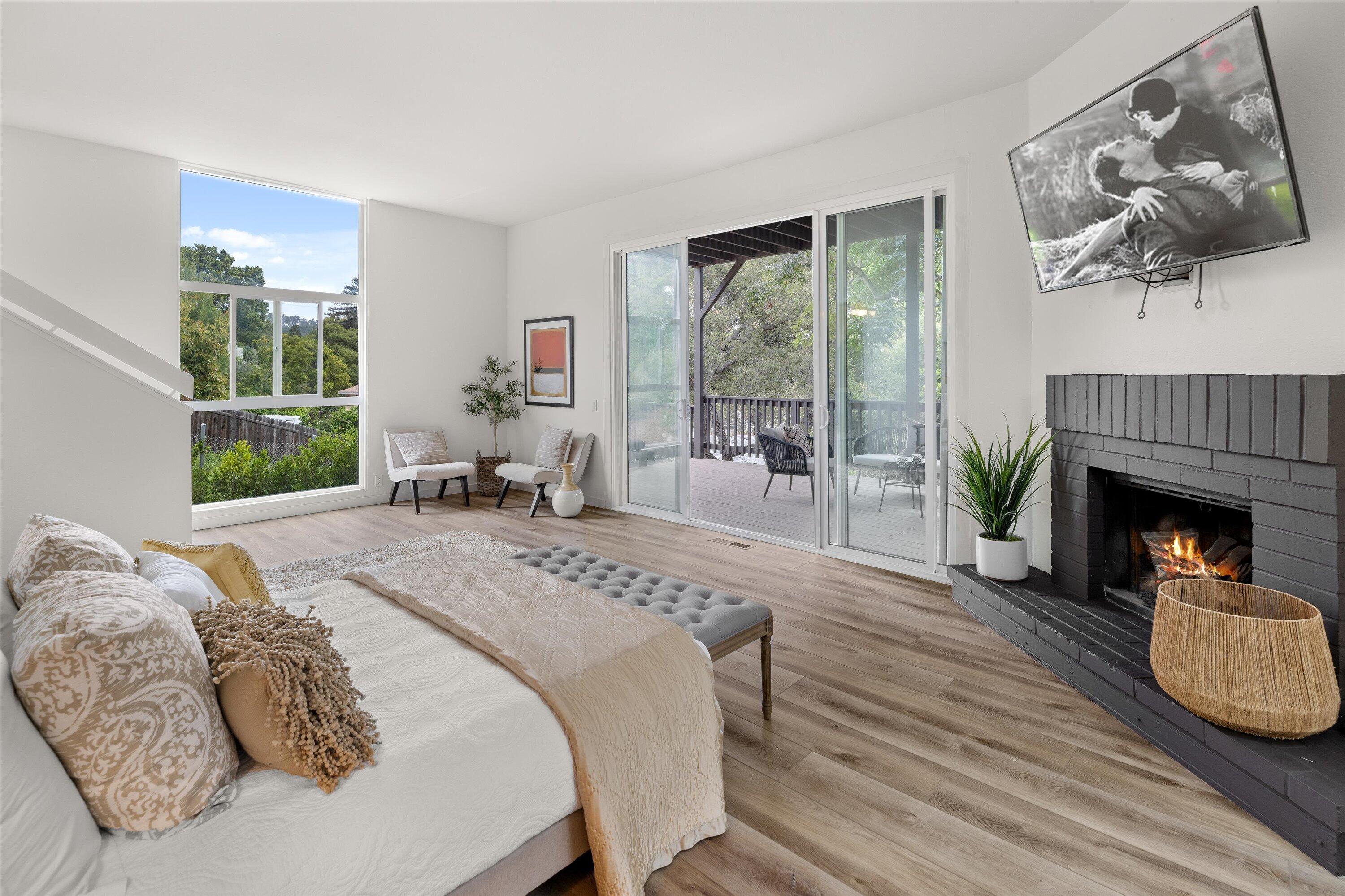 827 Cheltenham Road Santa Barbara, CA 93105 - Photo 17 of 47 a bedroom with a bed a table and chair