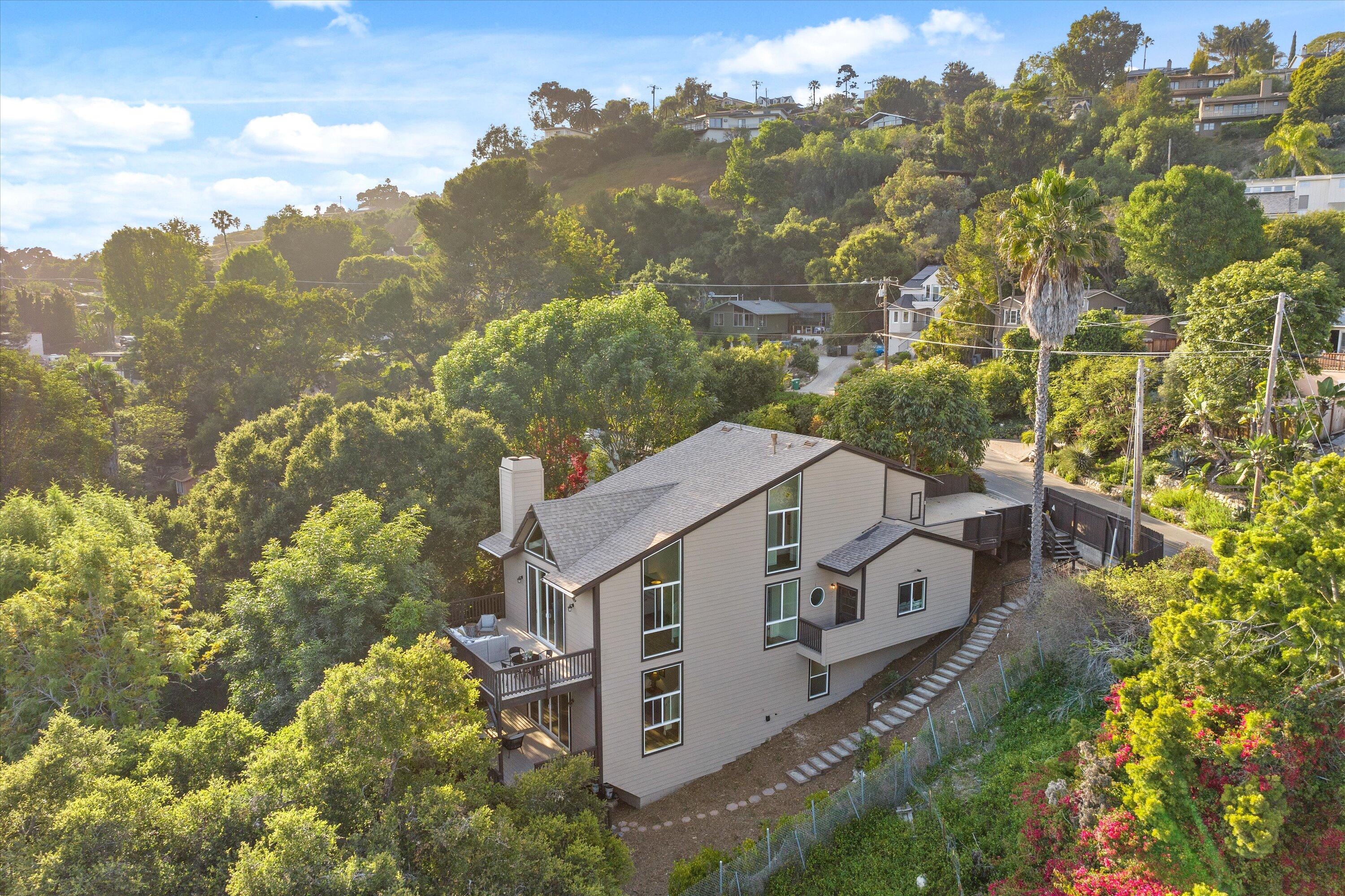827 Cheltenham Road Santa Barbara, CA 93105 - Photo 2 of 47 an aerial view of a house with a yard