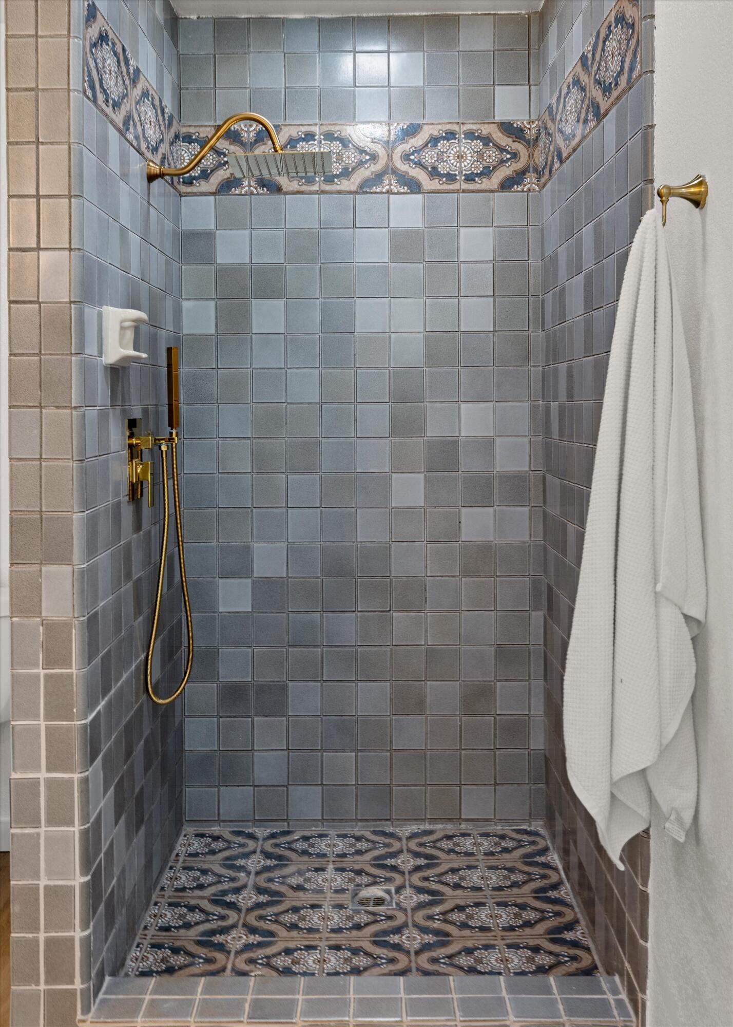 827 Cheltenham Road Santa Barbara, CA 93105 - Photo 22 of 47 a bathroom with a shower