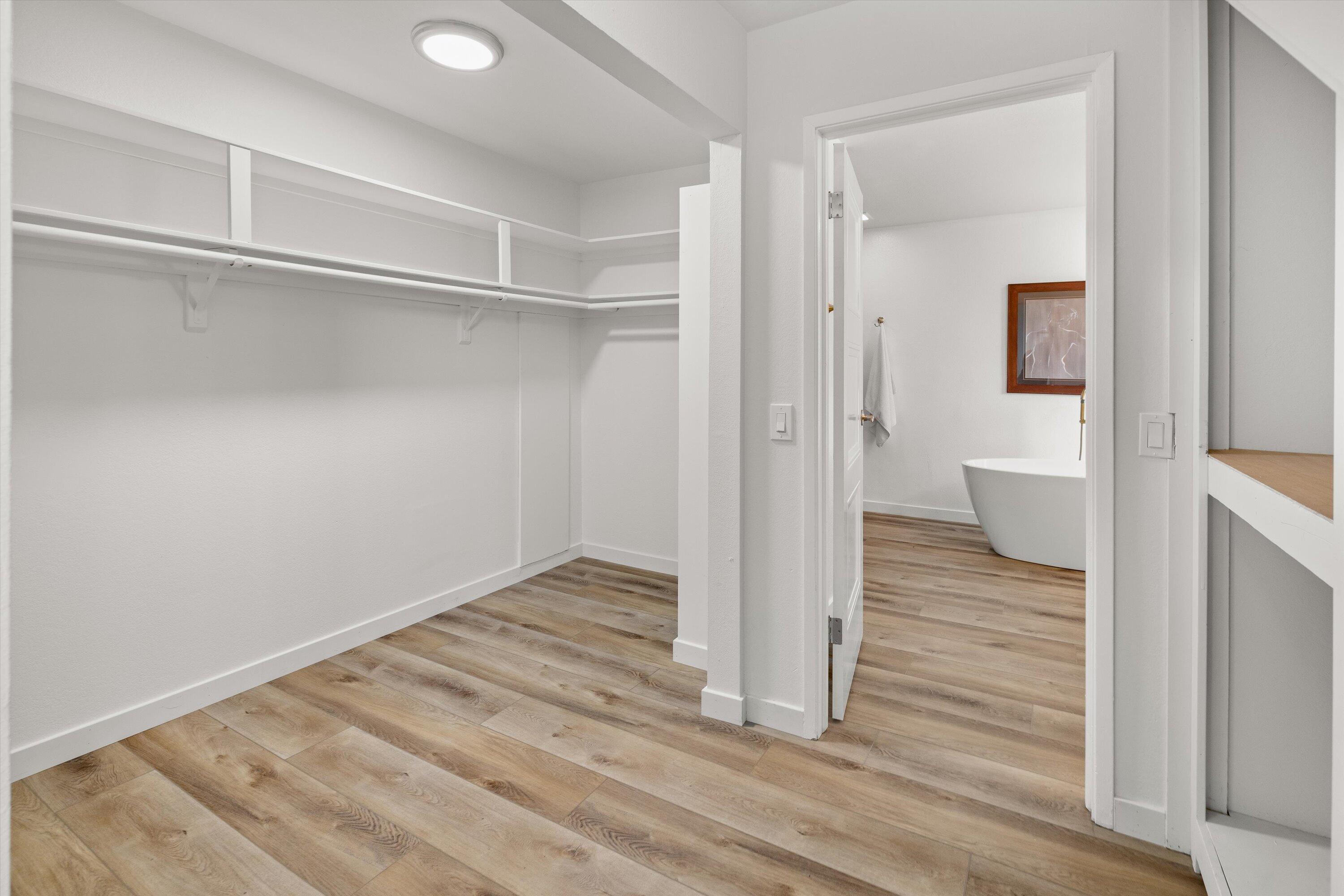 827 Cheltenham Road Santa Barbara, CA 93105 - Photo 23 of 47 a view of a room with wooden floor and a bathroom