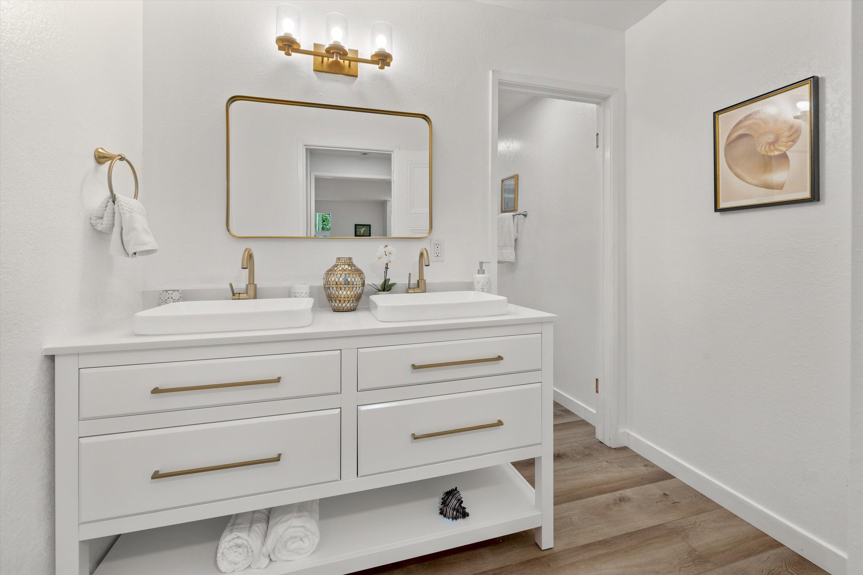 827 Cheltenham Road Santa Barbara, CA 93105 - Photo 28 of 47 a bathroom with a sink vanity and mirror
