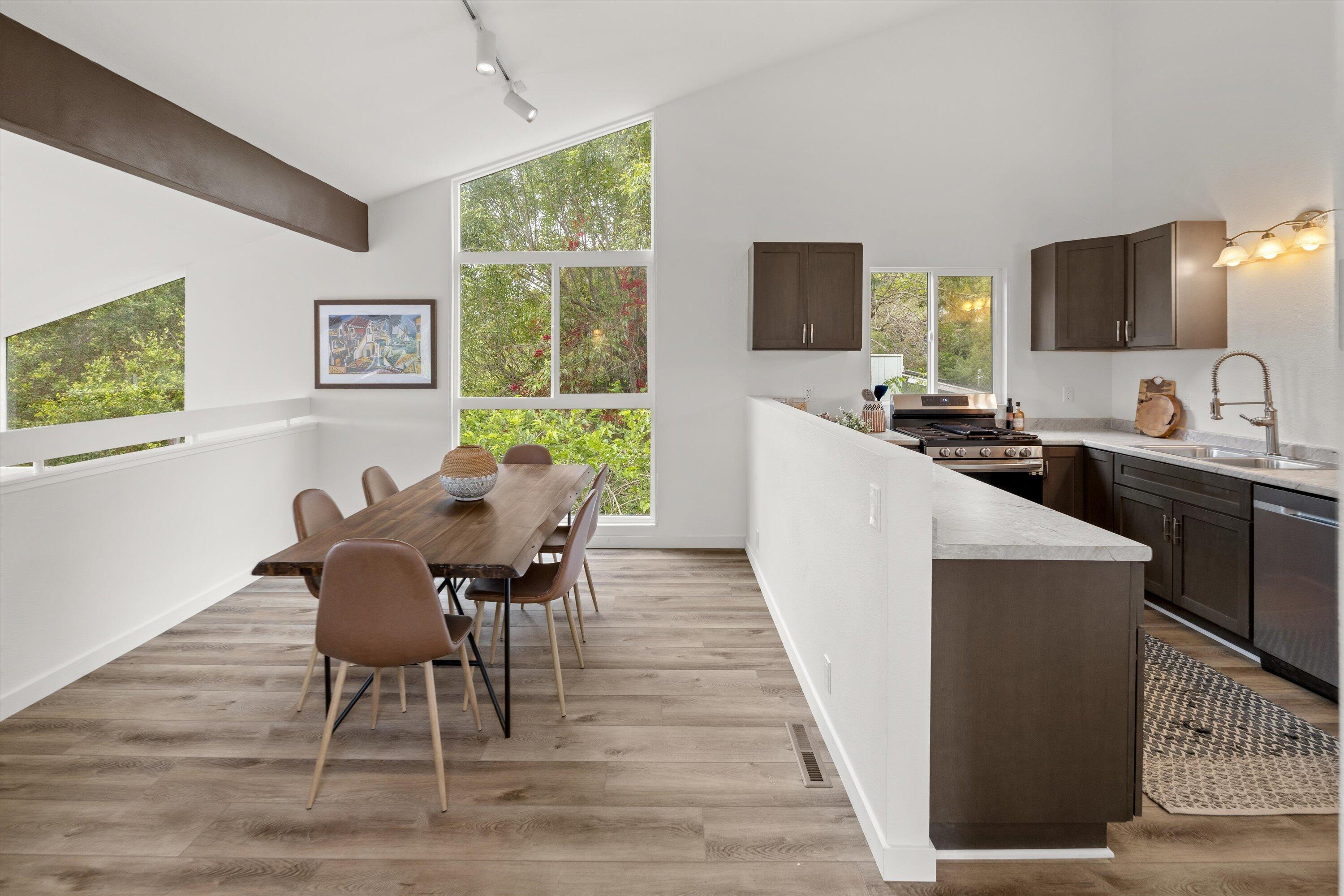 827 Cheltenham Road Santa Barbara, CA 93105 - Photo 43 of 47 a view of a dining room with furniture and a window