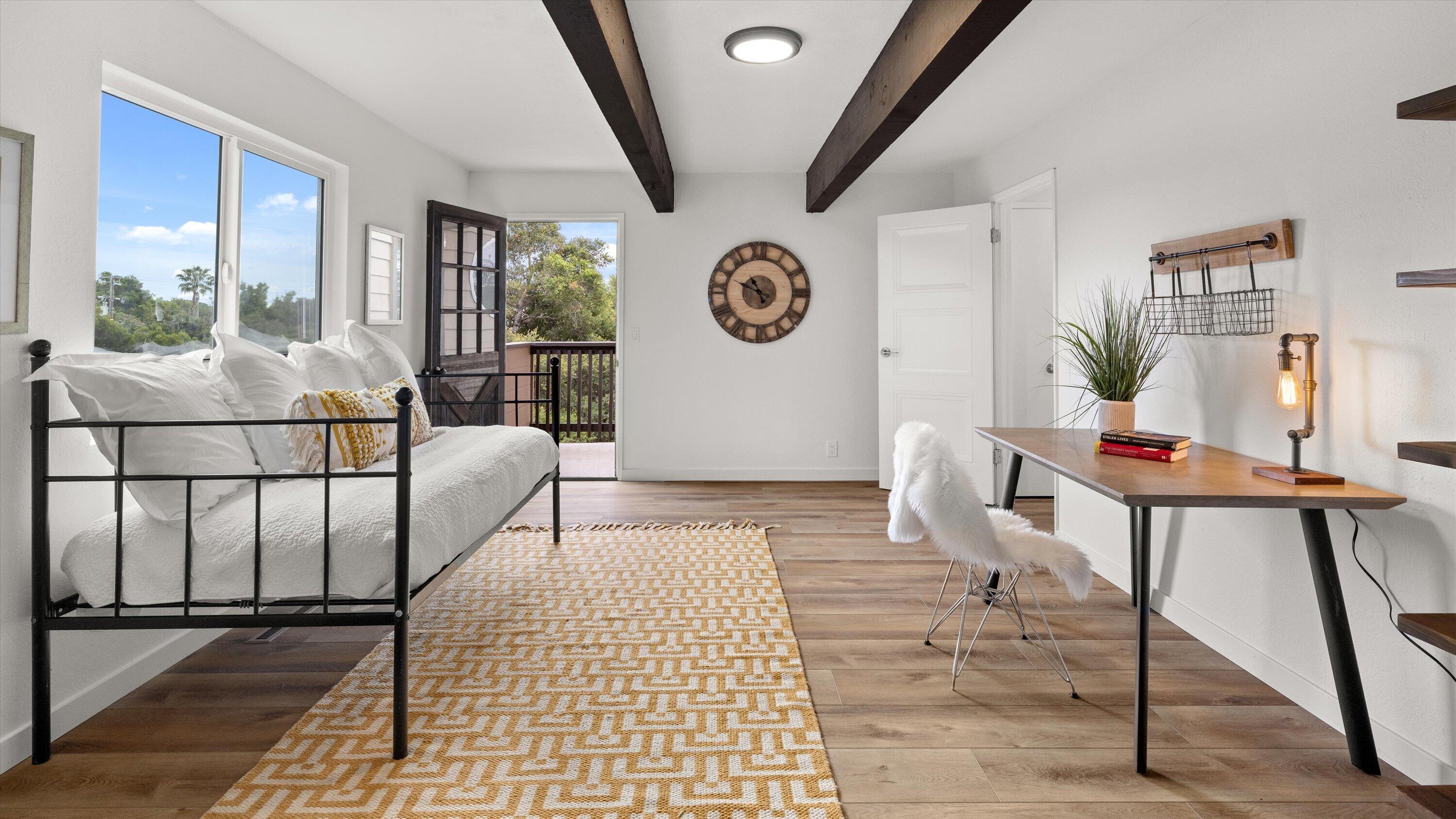 827 Cheltenham Road Santa Barbara, CA 93105 - Photo 31 of 47 a living room with furniture and a window