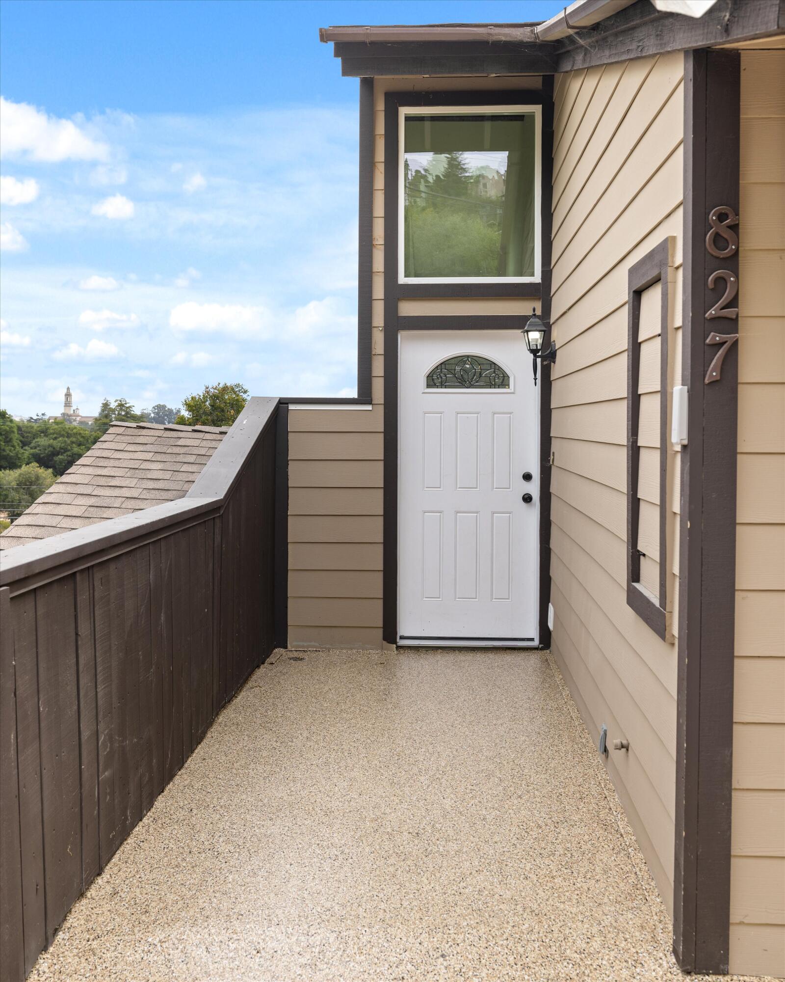 827 Cheltenham Road Santa Barbara, CA 93105 - Photo 33 of 47 a view of a balcony with wooden floor and fence