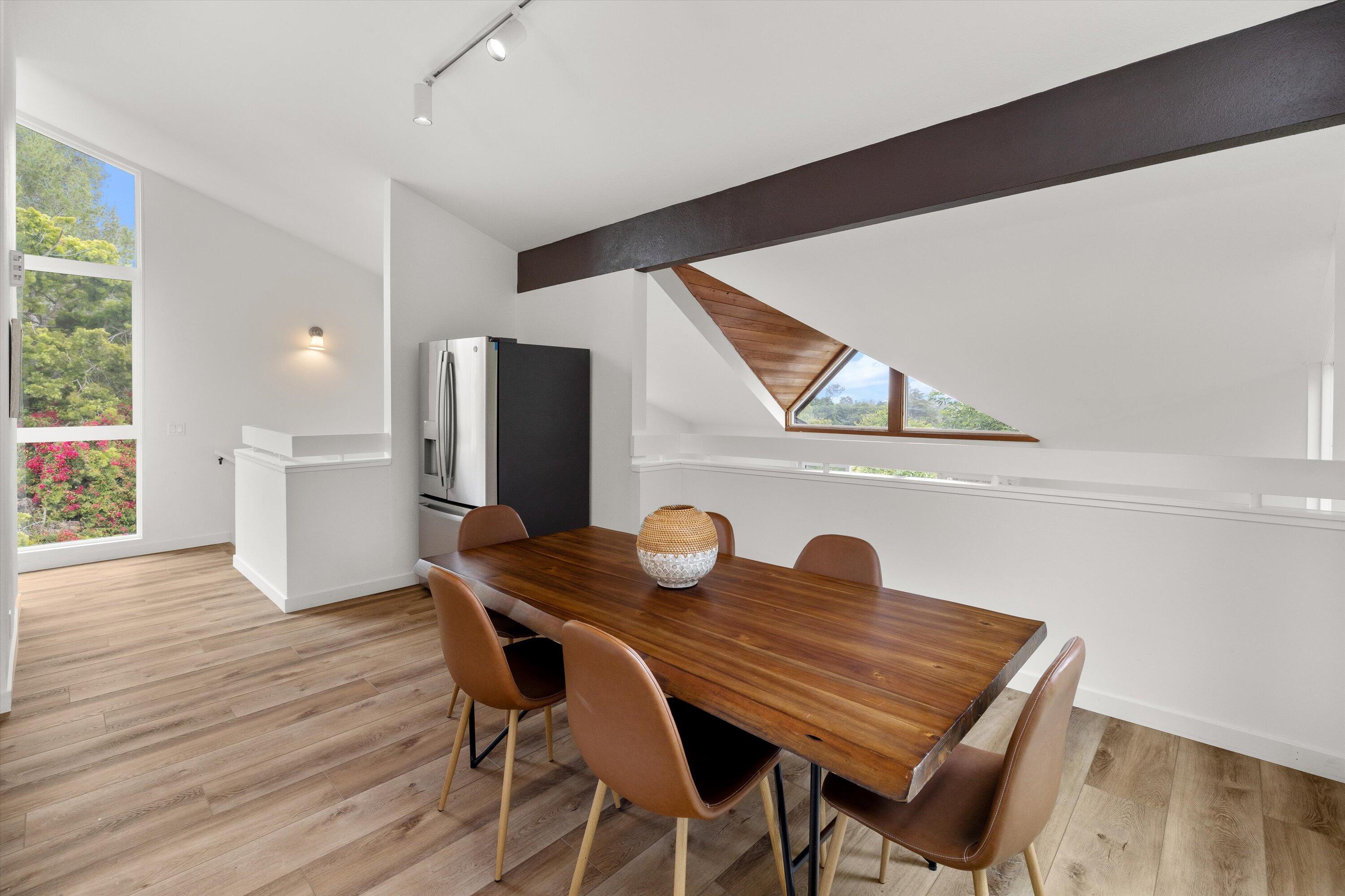 827 Cheltenham Road Santa Barbara, CA 93105 - Photo 6 of 47 a view of a dining room with furniture and wooden floor