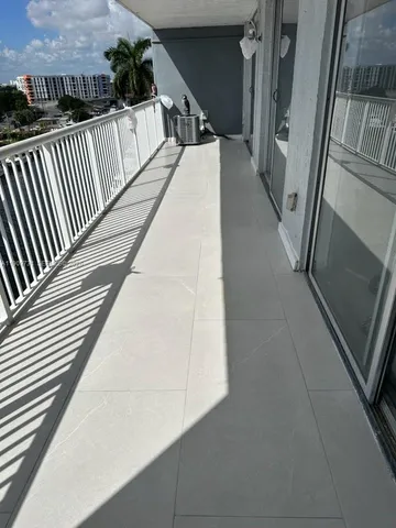 a bathroom with a toilet a sink and a mirror