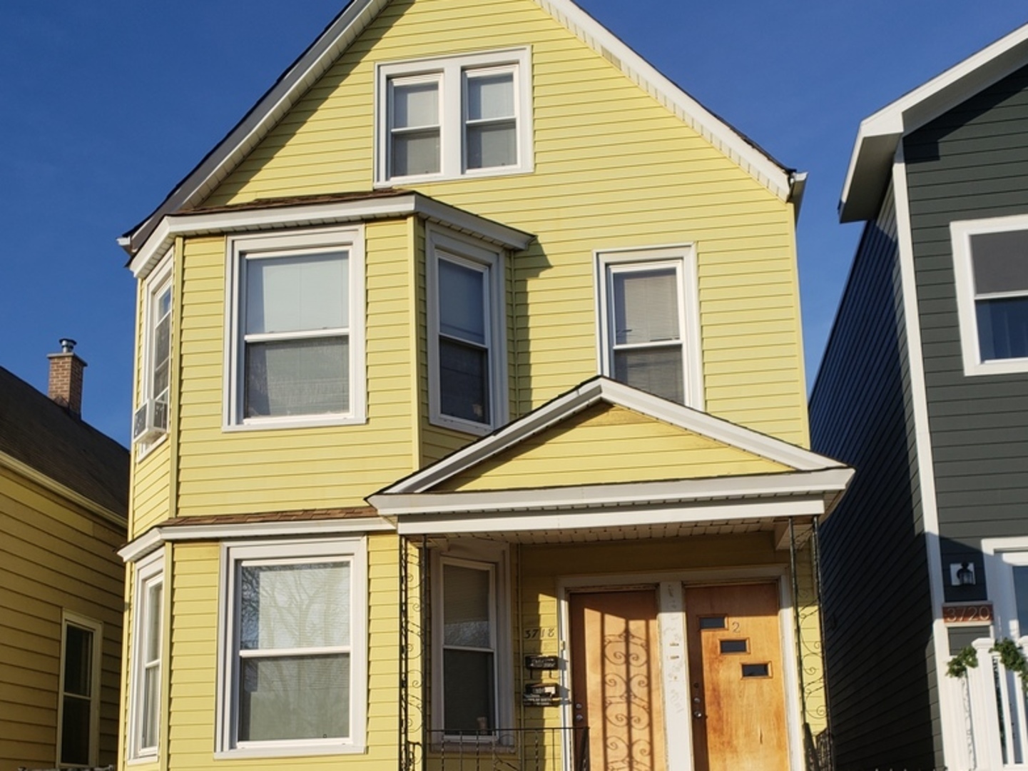 3718 North Spaulding Avenue Chicago, IL 60618 - Photo 2 of 18 a view of small white house