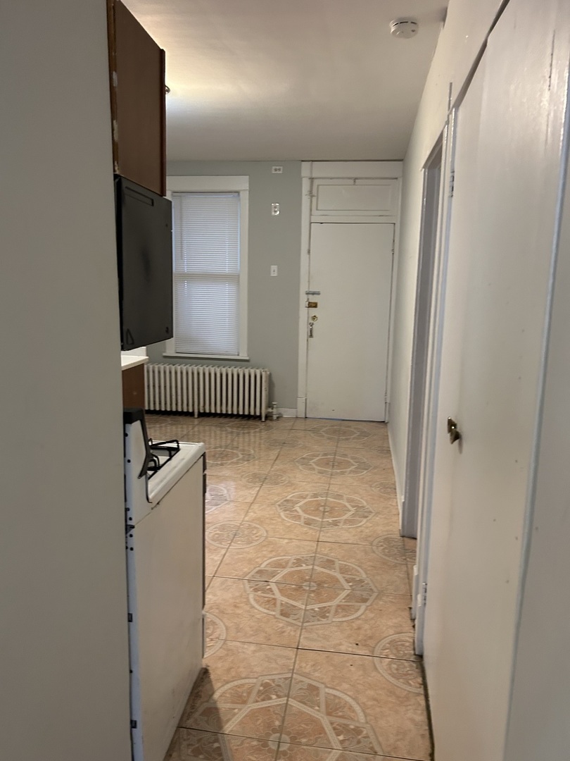 3718 North Spaulding Avenue Chicago, IL 60618 - Photo 10 of 18 a view of a hallway with staircase