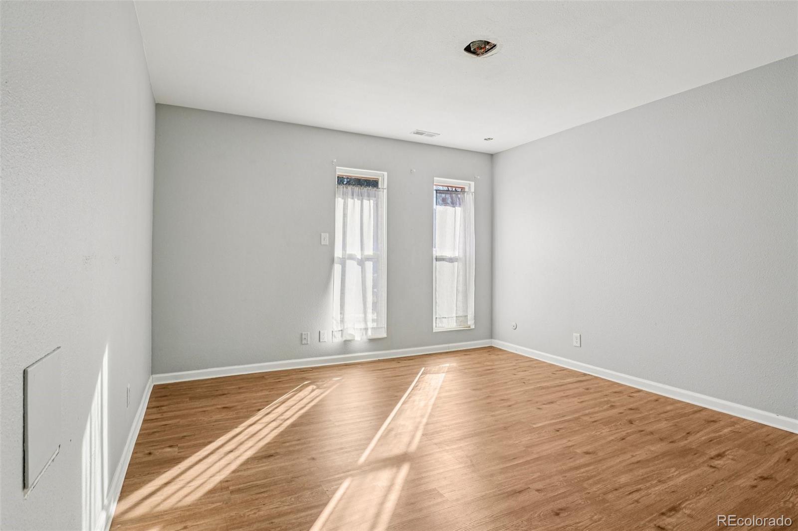 10095 West 35th Avenue Wheat Ridge, CO 80033 - Photo 25 of 50 a view of an empty room and window