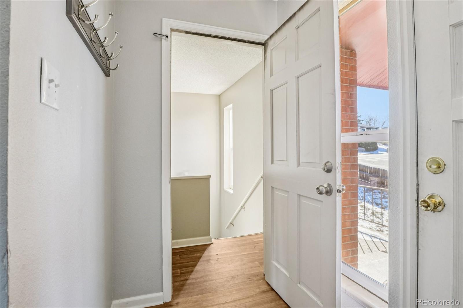 10095 West 35th Avenue Wheat Ridge, CO 80033 - Photo 30 of 50 a bathroom with a shower and a glass door