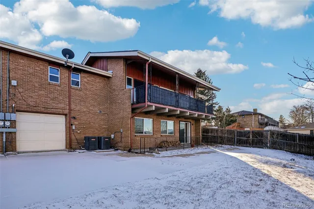 a view of a balcony with chairs