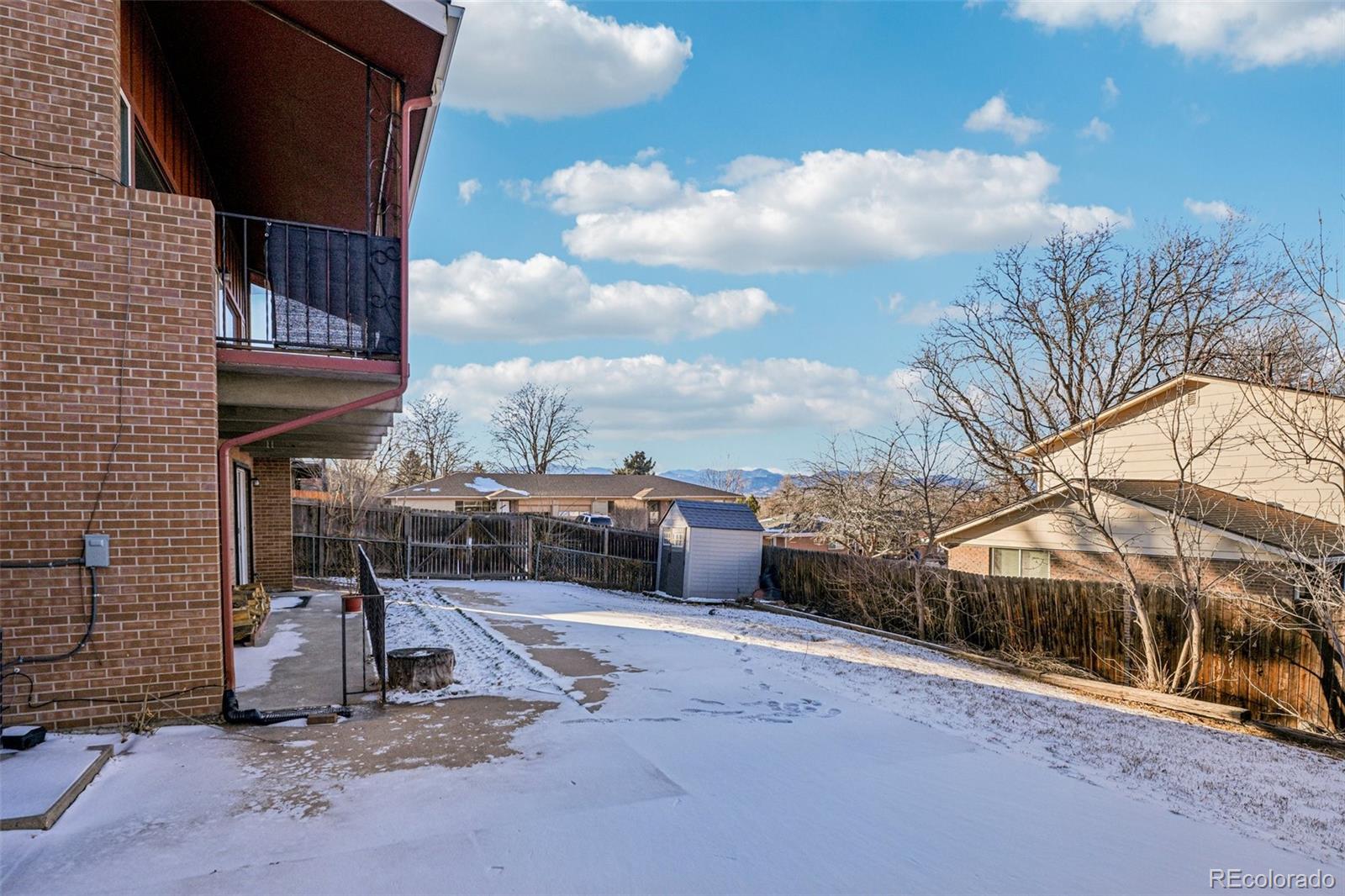 10095 West 35th Avenue Wheat Ridge, CO 80033 - Photo 48 of 50 a view of a house with a yard