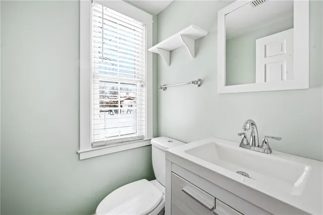 a bathroom with a sink and a toilet