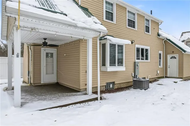a front view of a house with parking