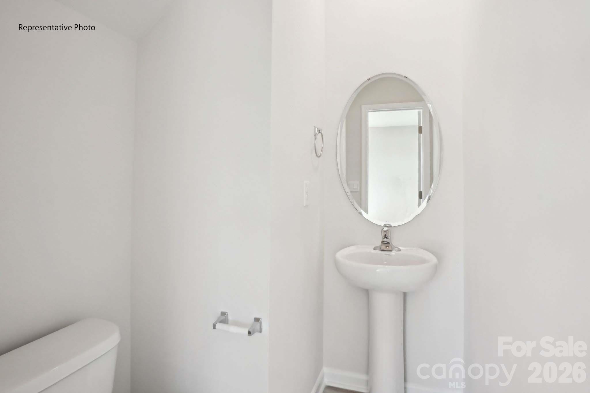 2015 Moorside Court Lancaster, SC 29720 - Photo 30 of 46 a close up of a mirror with a sink