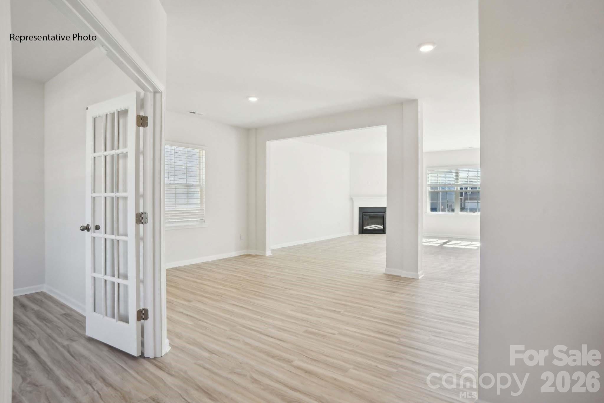 2015 Moorside Court Lancaster, SC 29720 - Photo 3 of 46 a view of an empty room with wooden floor and a window