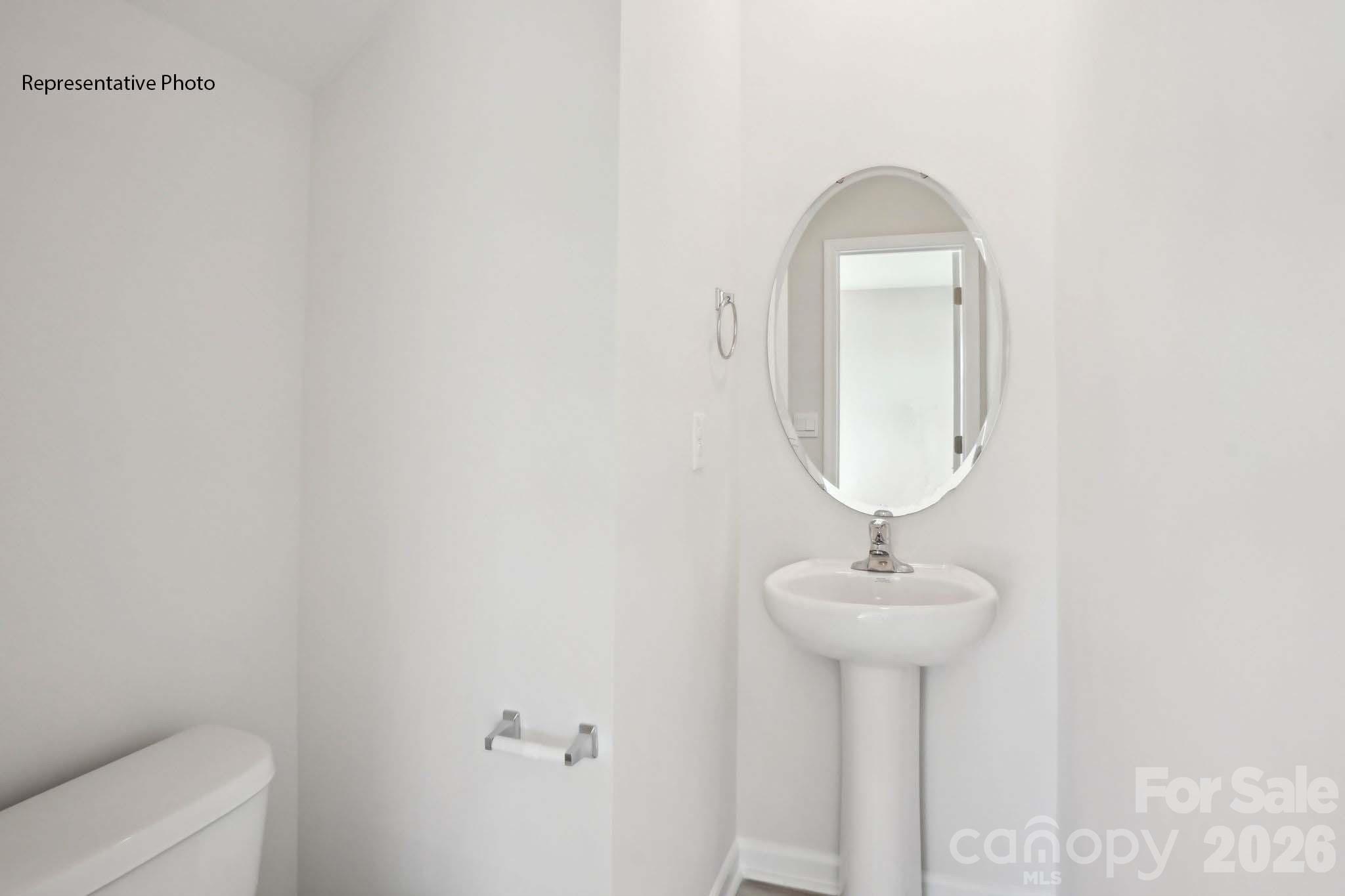 2015 Moorside Court Lancaster, SC 29720 - Photo 31 of 46 a close up of a mirror with a sink