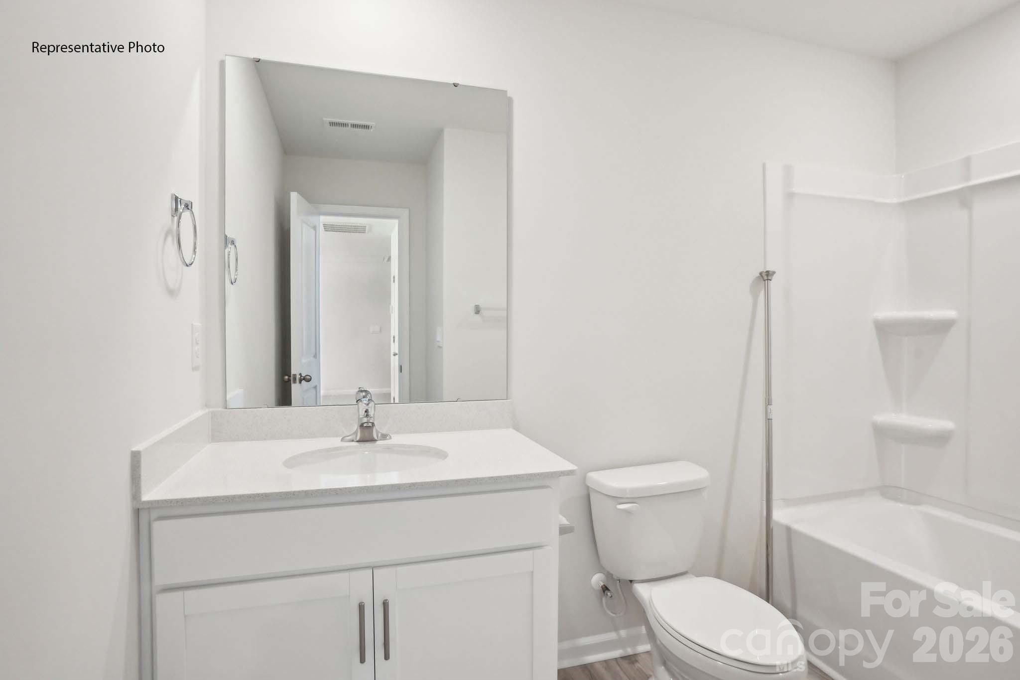 2015 Moorside Court Lancaster, SC 29720 - Photo 38 of 46 a bathroom with a sink toilet and shower