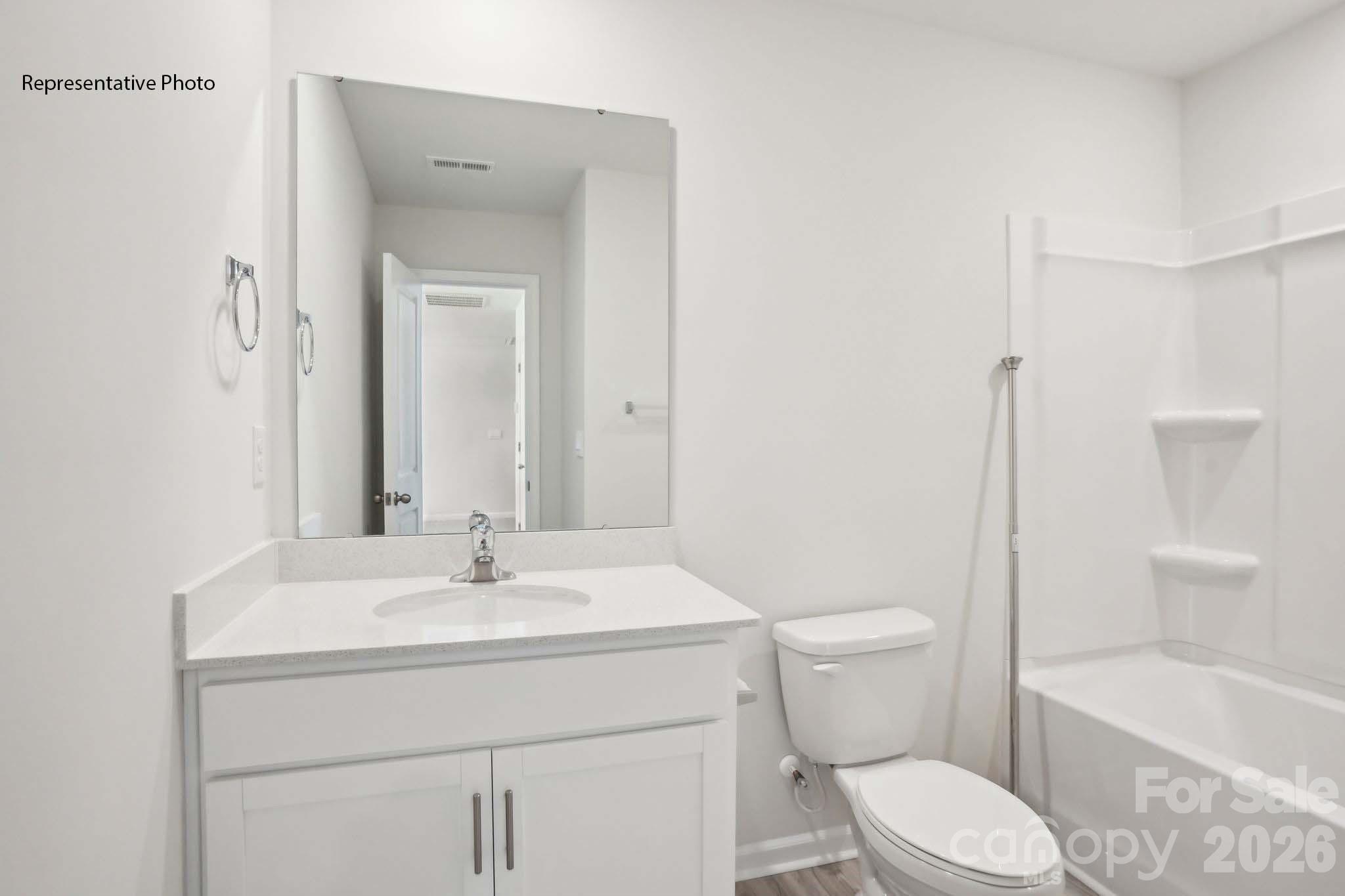 2015 Moorside Court Lancaster, SC 29720 - Photo 39 of 46 a bathroom with a sink toilet and shower