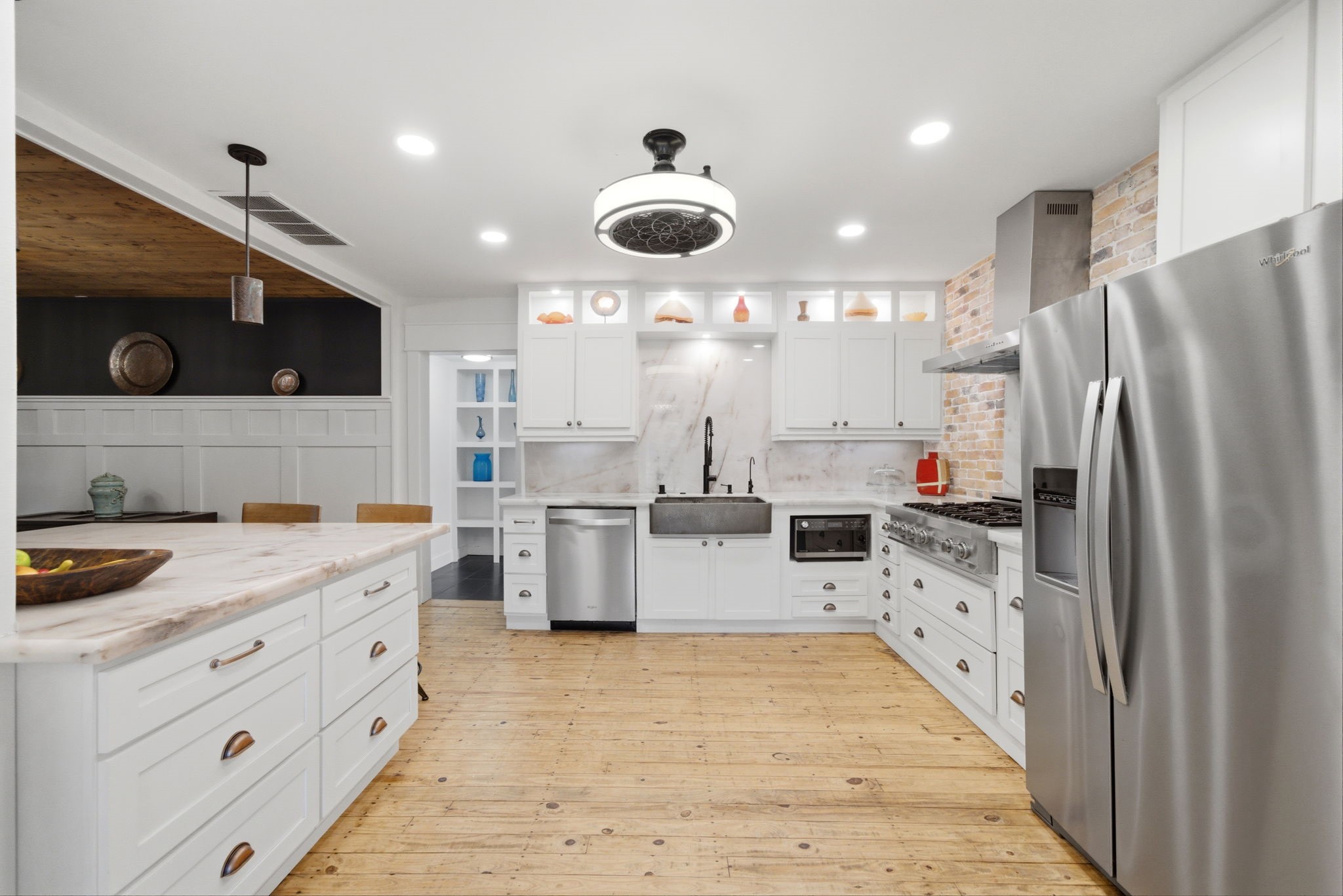 3128 Prospect Street Houston, TX 77004 - Photo 13 of 36 a kitchen with cabinets and refrigerator