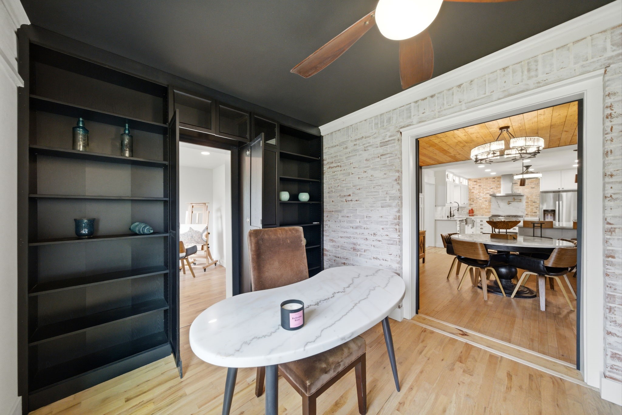 3128 Prospect Street Houston, TX 77004 - Photo 16 of 36 a view of a dining room with furniture and wooden floor