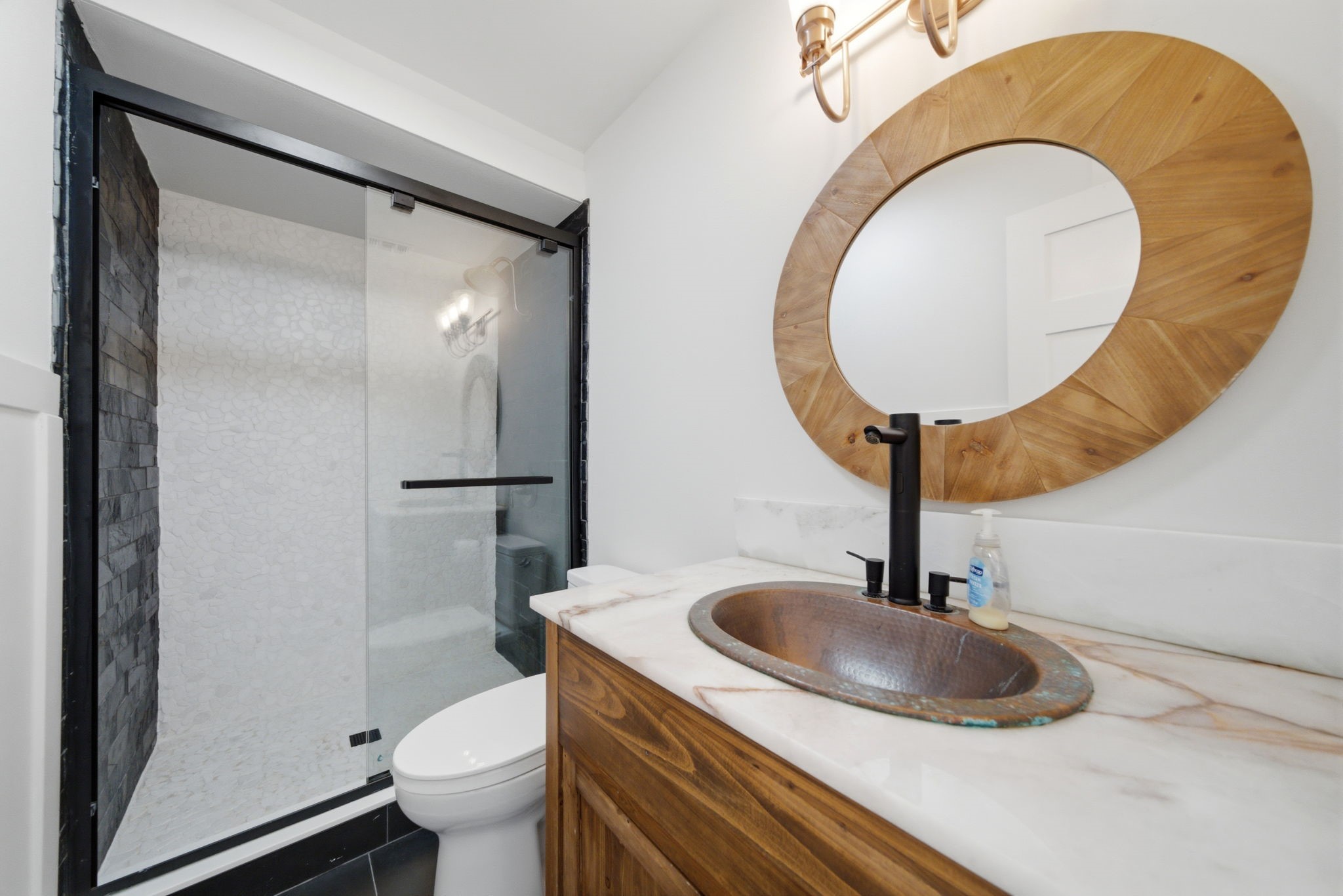 3128 Prospect Street Houston, TX 77004 - Photo 20 of 36 a bathroom with a sink and mirror