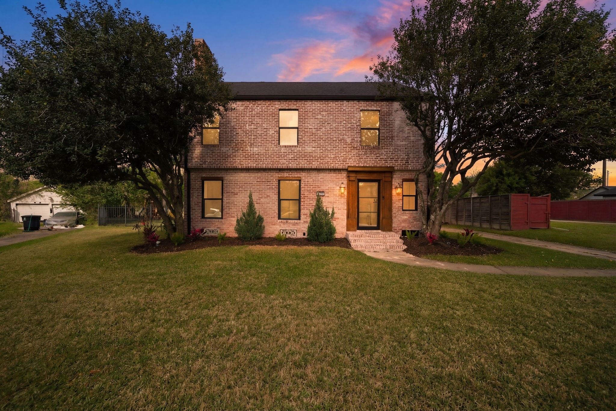 3128 Prospect Street Houston, TX 77004 - Photo 35 of 36 a front view of a house with a yard