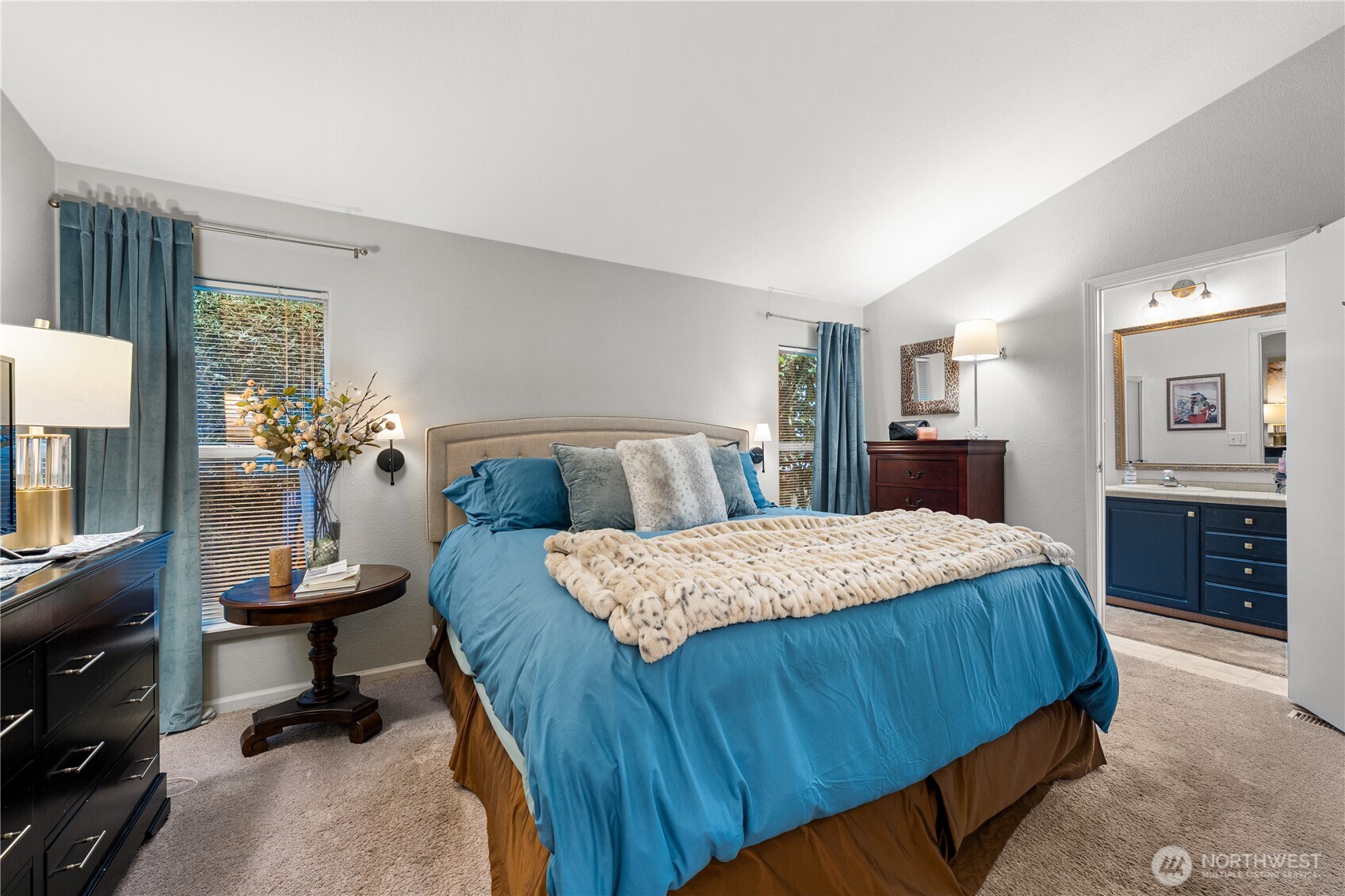 23825 15th Avenue Southeast, Unit 40 Bothell, WA 98021 - Photo 18 of 39 a bedroom with a bed and dresser