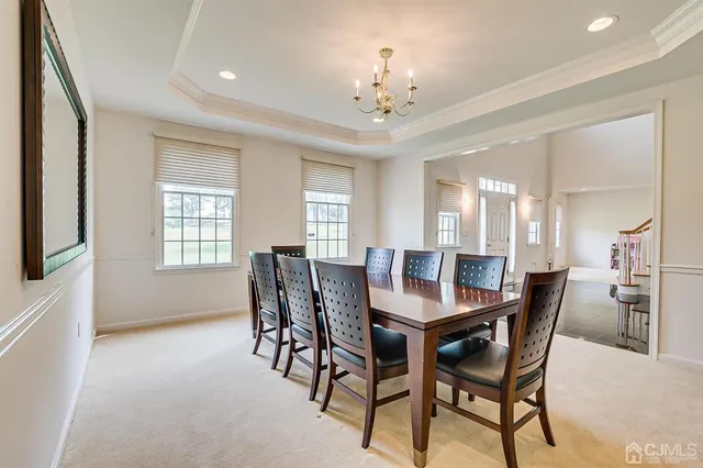 a view of workspace with furniture and windows