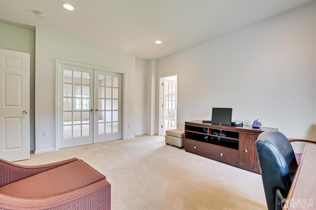 12 Hayduk Drive Edison, NJ 08820 - Photo 21 of 64 a bedroom with a bed and wooden floor