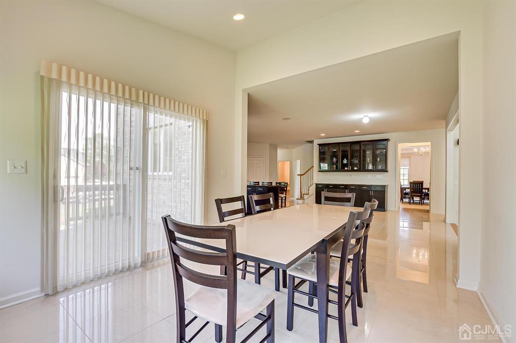 12 Hayduk Drive Edison, NJ 08820 - Photo 29 of 64 a view of a dining room with furniture and a window