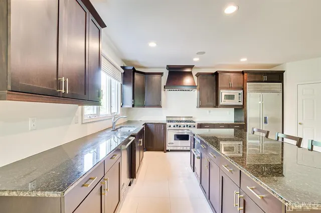 a view of entryway and hall with dining room