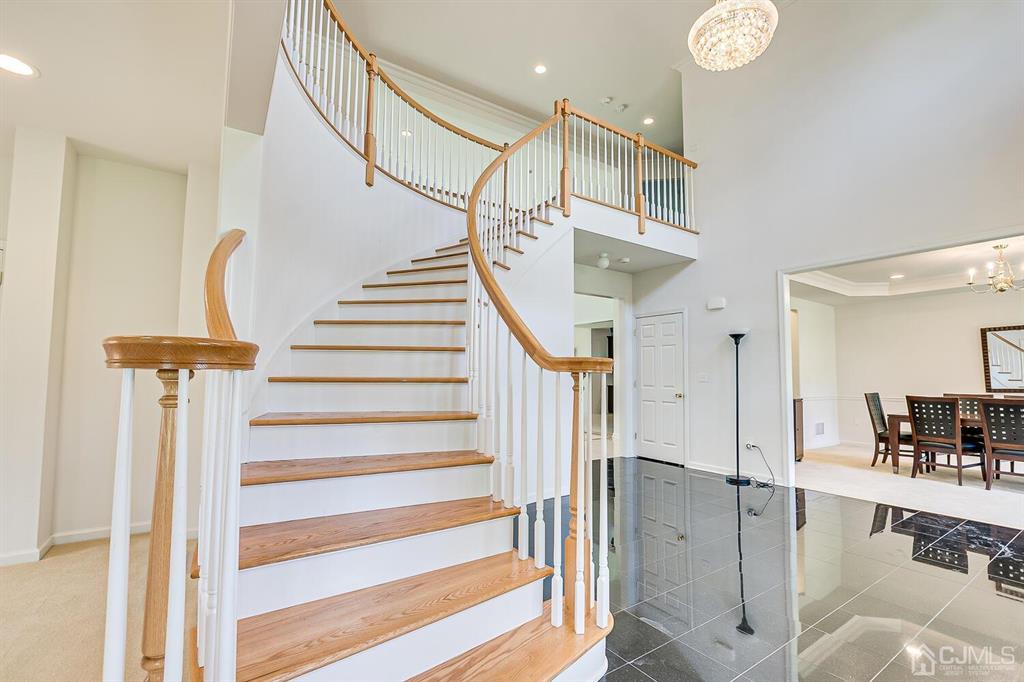 12 Hayduk Drive Edison, NJ 08820 - Photo 40 of 64 a view of entryway and hall with dining room