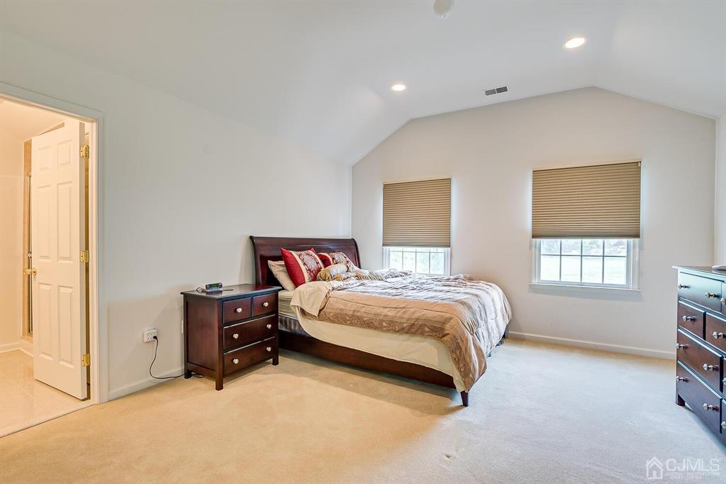 12 Hayduk Drive Edison, NJ 08820 - Photo 50 of 64 a spacious bedroom with a bed and a window