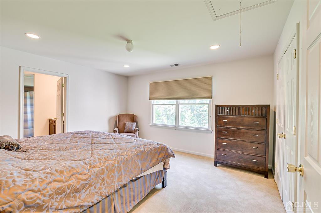 12 Hayduk Drive Edison, NJ 08820 - Photo 53 of 64 a bedroom with a bed and a dresser